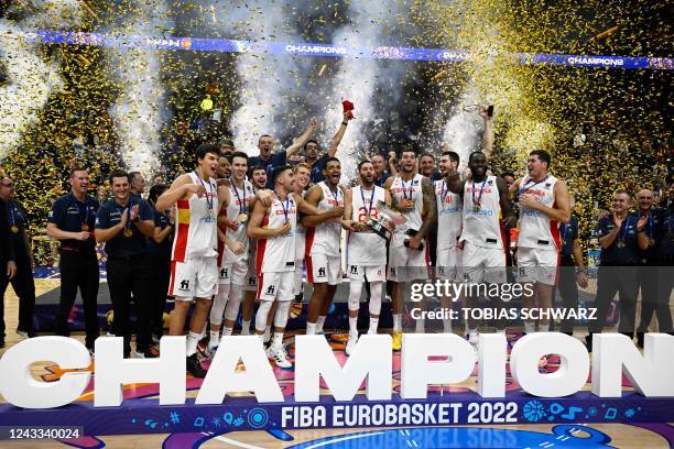 Spain's team celebrates with the trophy after the FIBA Eurobasket 2022 final basketball match between Spain and France in Berlin on September 18,...