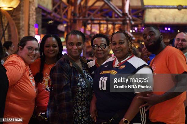 Fans pose for a photograph before game 5 of the WNBA Finals on September 18, 2022 at Mohegan Sun Arena in Uncasville, Connecticut. NOTE TO USER: User...