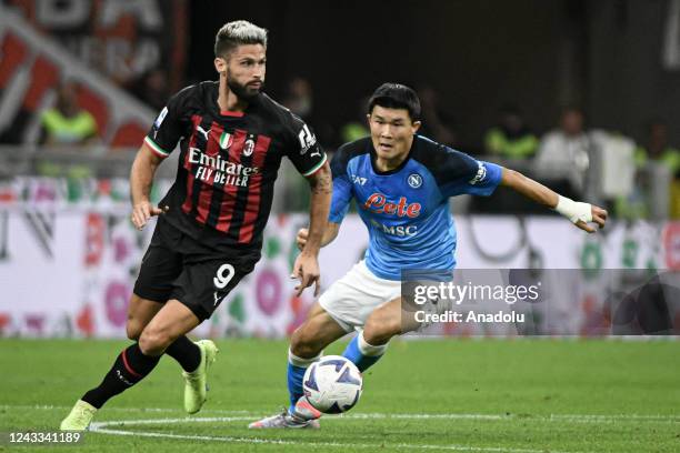 Olivier Giroud of AC Milan and Kim Min-jae of SSC Napoli during the Serie A championship football match AC Milan vs Napoli at San Siro Stadium in...