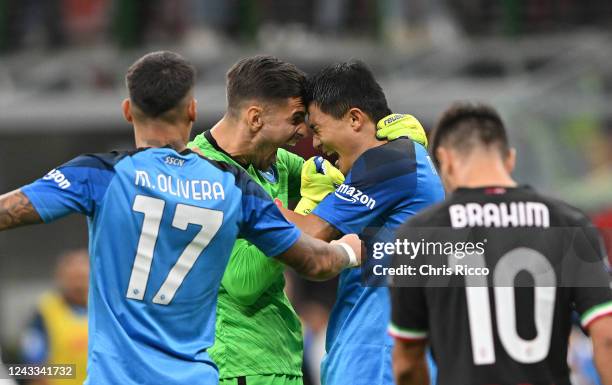 Alex Meret of SSC Napoli celebrates with teammate Min-Jae Kim of SSC Napoli after the Serie A match between AC Milan and SSC Napoli at Stadio...