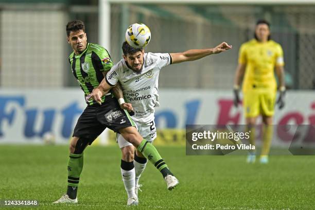 Henrique Almeida of America and Bruno Mendez of Corinthians fight for the ball during a match between America and Corinthians as part of Brasileirao...