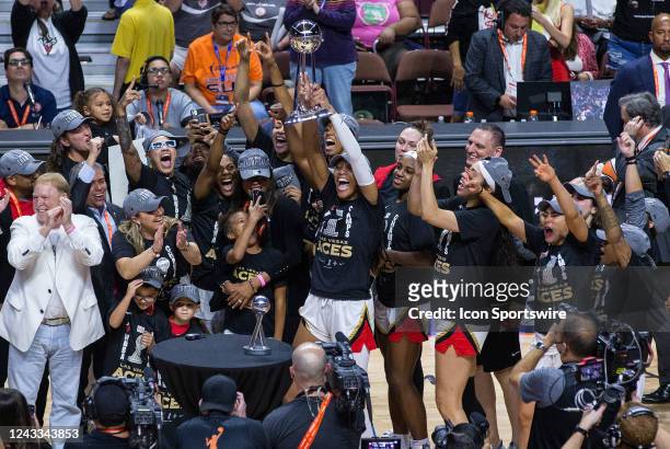 Las Vegas Aces celebrate after defeating the Connecticut Sun and winning the 2022 WNBA championship on September 18 at Mohegan Sun Arena in...