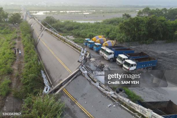 An aerial view shows the collapsed Kaoliao bridge in eastern Taiwan's Hualien county on September 19 following a 6.9 magnitude earthquake on...