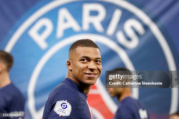 Kylian Mbappe of Paris Saint-Germain looks on before the Ligue 1 match between Olympique Lyonnais and Paris Saint-Germain at Groupama Stadium on...