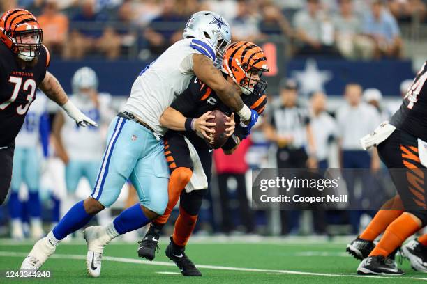 Micah Parsons of the Dallas Cowboys sacks Joe Burrow of the Cincinnati Bengals at AT&T Stadium on September 18, 2022 in Arlington, Texas.