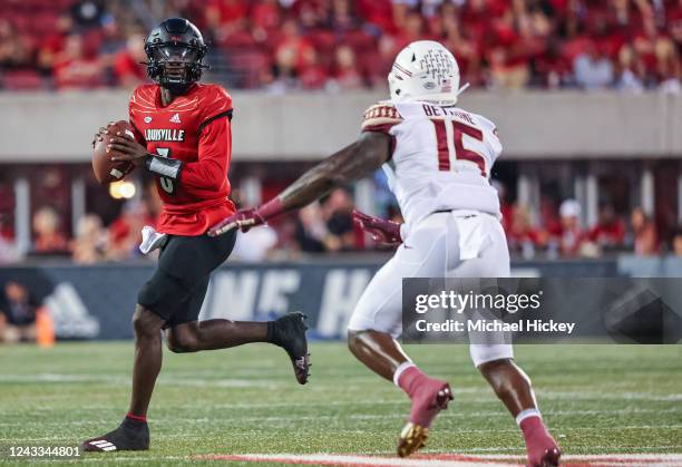 Malik Cunningham of the Louisville Cardinals runs the ball during the game against the Florida State Seminoles at Cardinal Stadium on September 16,...