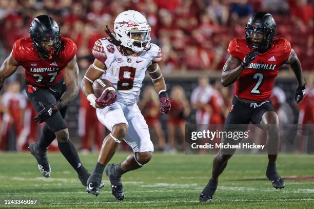 Treshaun Ward of the Florida State Seminoles runs the ball during the game against the Louisville Cardinals at Cardinal Stadium on September 16, 2022...