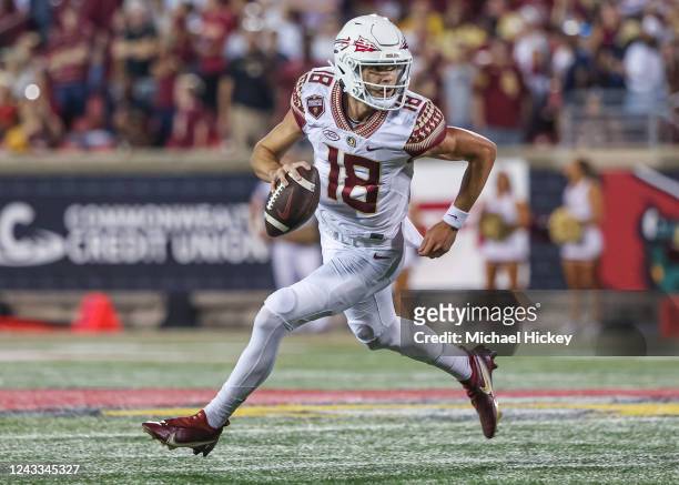 Tate Rodemaker of the Florida State Seminoles runs the ball during the game against the Louisville Cardinals at Cardinal Stadium on September 16,...
