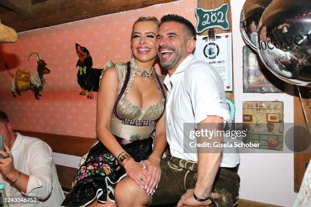 Verena Kerth and Marc Terenzi during the Almauftrieb as part of the Oktoberfest 2022 at Kaefer-Schänke tent at Theresienwiese on September 18, 2022...