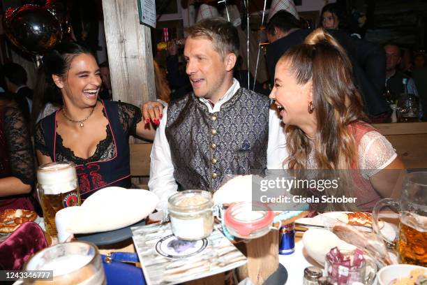 Amira Pocher, Oliver Pocher, Alessandra Meyer-Woelden during the Almauftrieb as part of the Oktoberfest 2022 at Kaefer-Schänke tent at Theresienwiese...