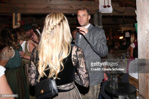 Bayern goal keeper Manuel Neuer and his girlfriend Anika Bissel during the Almauftrieb as part of the Oktoberfest 2022 at Kaefer-Schänke tent at...