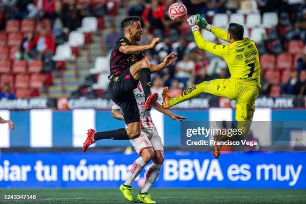 Franco di Santo of Tijuana fights for the ball with Luis Malagon of Necaxa during the 15th round match between Tijuana and Necaxa as part of the...