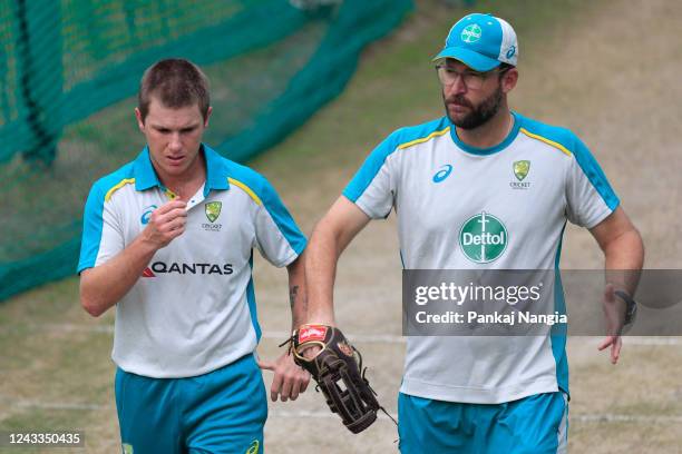 Adam Zampa of Australia and Daniel Vettori bowling coach of Australia during the practice session at Punjab Cricket Association Stadium on September...