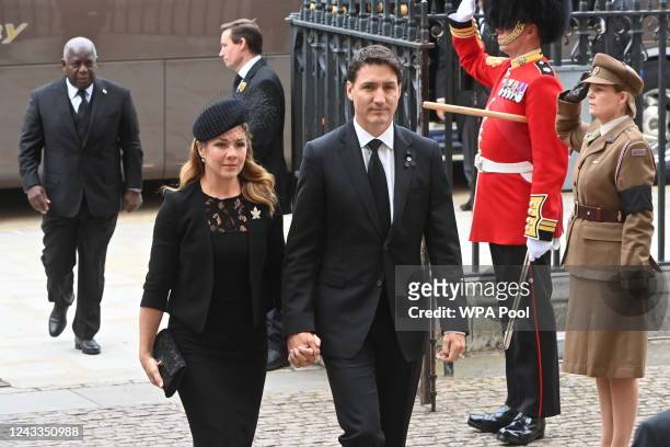 Prime Minister of Canada Justin Trudeau and his wife Sophie Trudeau arrive for the State Funeral of Queen Elizabeth II at Westminster Abbey on...