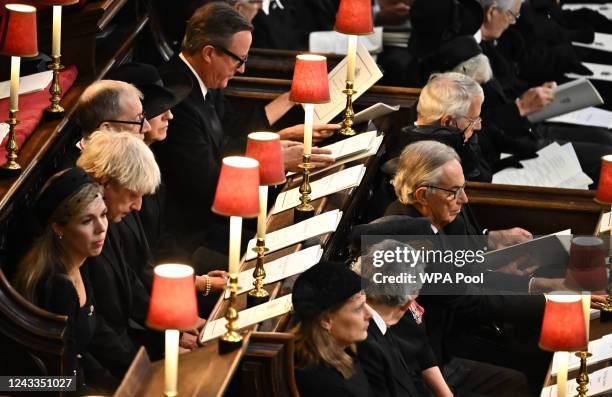 Former British Prime Ministers and spouses, L-R back pew Carrie Johnson, Boris Johnson, Philip May, Theresa May and David Cameron, front pew L-R...