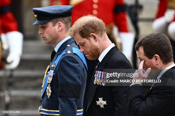 Britain's Prince William, Prince of Wales and Britain's Prince Harry , Duke of Sussex arrive at Westminster Abbey in London on September 19 for the...