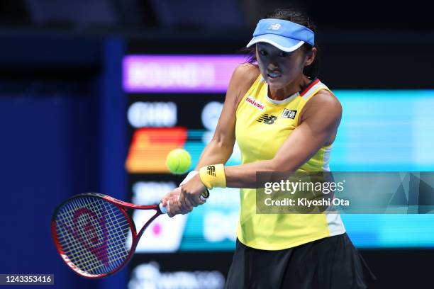 Misaki Doi of Japan plays a backhand in the Singles first round match against Zheng Qinwen of China during day one of Toray Pan Pacific Open at...