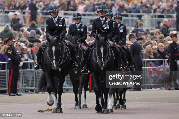 Mounted Metropolitan Police take part during the procession ahead of the state funeral of Queen Elizabeth II at Westminster Abbey on September 19,...