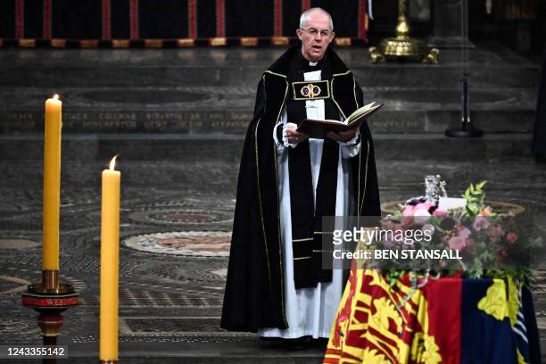 The Archbishop of Canterbury Justin Welby gives a reading at the State Funeral Service for Britain's Queen Elizabeth II, at Westminster Abbey in...