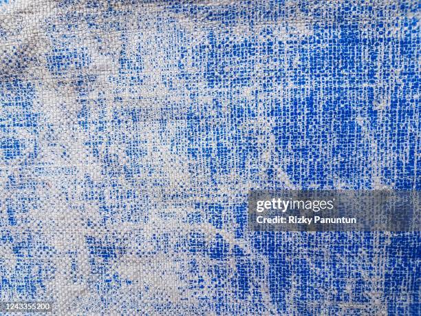 full frame of old blue tarpaulin - blue lined paper stock pictures, royalty-free photos & images