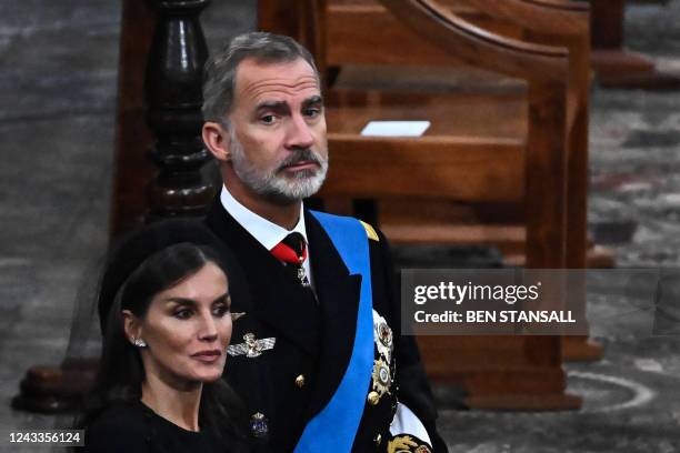 Spain's King Felipe VI and Spain's Queen Letizia attend the State Funeral Service for Britain's Queen Elizabeth II, at Westminster Abbey in London on...