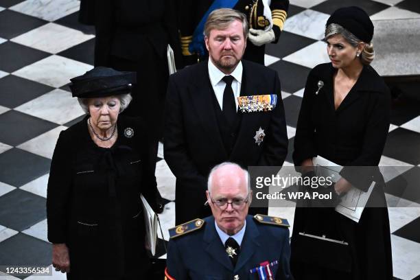 Netherlands' Princess Beatrix , King Willem-Alexander of the Netherlands and Queen Maxima of the Netherlands leave Westminster Abbey on September 19,...