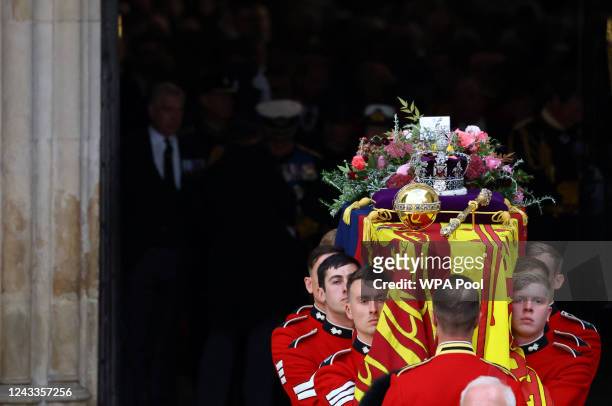 The coffin is carried out by pallbearers after the State Funeral of Queen Elizabeth II at Westminster Abbey on September 19, 2022 in London, England....