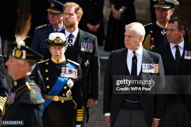 Princess Anne, Princess Royal, Prince Andrew, Duke of York, Prince Harry, Duke of Sussex, Peter Phillips and Timothy Laurence leave after the State...