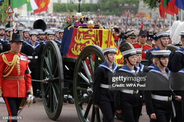 Flowers and the Imperial State Crown are seen on the coffin outside Westminster Abbey after the State Funeral of Queen Elizabeth II on September 19,...