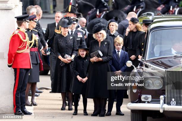 Camilla, Queen Consort, Prince George of Wales, Catherine, Princess of Wales, Princess Charlotte of Wales and Sophie, Countess of Wessex watch the...