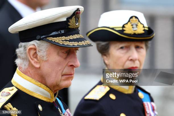 King Charles and Anne, Princess Royal attend the state funeral and burial of Queen Elizabeth at Westminster Abbey on September 19, 2022 in London,...
