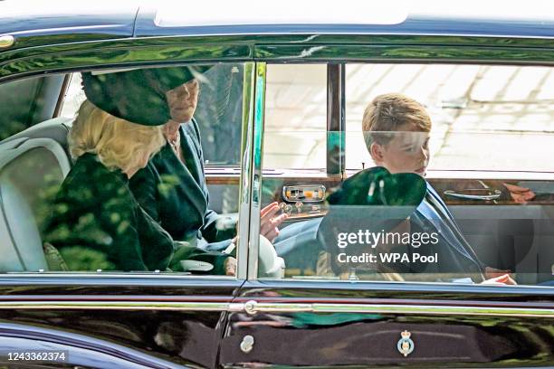 Camilla, Queen Consort , Catherine, Princess of Wales, Prince George and Princess Charlotte of Wales follow the coffin of Queen Elizabeth II pulled...