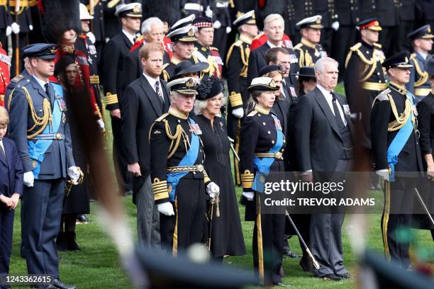 Britain's Prince George of Wales, Britain's Prince William, Prince of Wales, Britain's Prince Harry, Duke of Sussex, Meghan, Duchess of Sussex,...