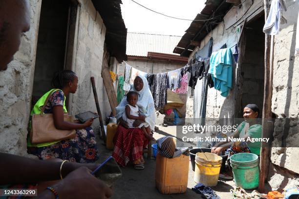 Census taker 1st L conducts a population and housing information survey in Dar es Salaam, Tanzania on Aug. 23, 2022. Tanzania on Tuesday began...