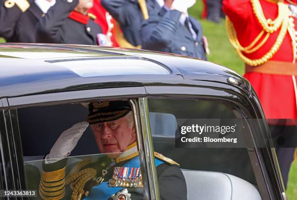 King Charles III salutes during Queen Elizabeth II's state funeral, near Wellington Arch in London, UK, on Monday, Sept. 19, 2022. The Queen's life...