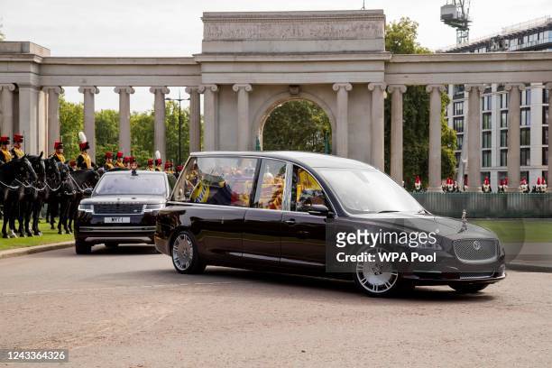 The coffin of Queen Elizabeth II is transported in a hearse from Wellington Arch following her state funeral and burial of Queen Elizabeth II on...