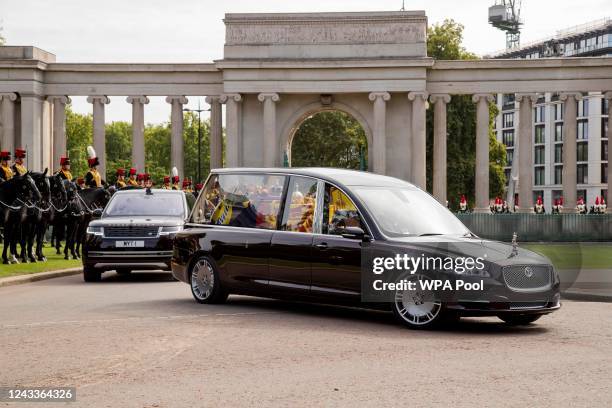 The coffin of Queen Elizabeth II is transported in a hearse from Wellington Arch following her state funeral and burial of Queen Elizabeth II on...