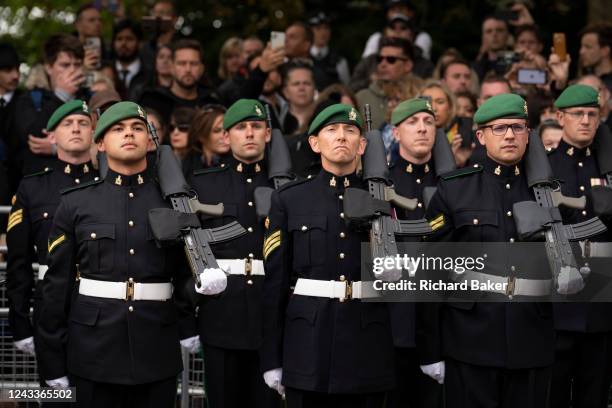 Following the death of Queen Elizabeth II at the age of 96, Royal Marines prepare to stabnd guard before her funeral procession from Westminster...