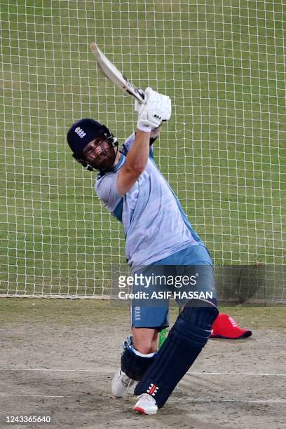 England's Phil Salt bats in nets during a practice session at the National Cricket Stadium in Karachi on September 19 on the eve of their first...