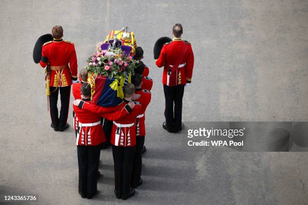 The Bearer Party transfer the coffin of Queen Elizabeth II, draped in the Royal Standard, into the State Hearse at Wellington Arch following the...