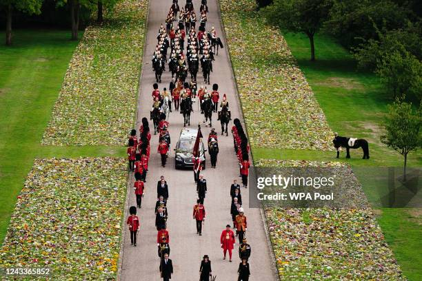 Emma, the monarch's fell pony, stands as the Ceremonial Procession of the coffin of Queen Elizabeth II arrives at Windsor Castle ahead of the...