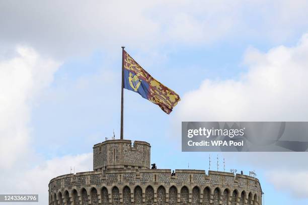 The Royal Standard flies above Windsor Castle on September 19, 2022 in Windsor, England. The committal service at St George's Chapel, Windsor Castle,...