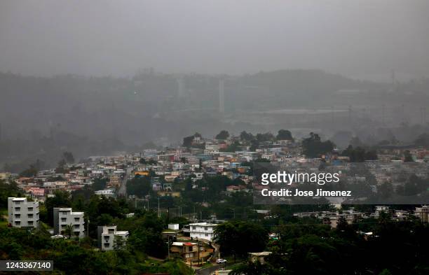 Rain falls on the town of Cayey one day after Hurricane Fiona struck on September 19, 2022 in Cayey, Puerto Rico. Hurricane Fiona struck this...