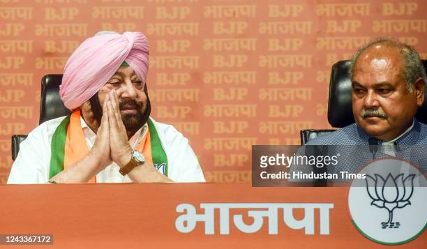 Former Punjab CM and Congress leader Captain Amarinder Singh with union minister Narendra Singh Tomar address media after he joined the BJP party at...