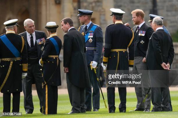 Britain's King Charles III, Prince Andrew, Princess Anne, Peter Phillips, Prince William, Tim Laurence, Prince Harry, the Duke of Gloucester and Earl...