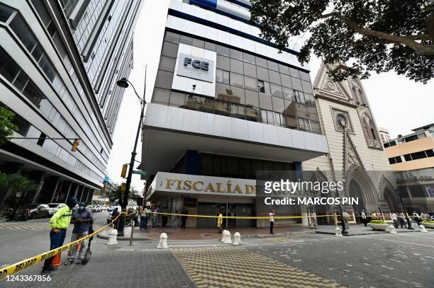 Police work at the crime scene of the murder of Ecuadorean prosecutor Edgar Escobar in front of the public prosecutor's office in Guayaquil, Ecuador,...