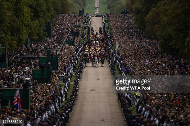 The cortege carrying the coffin of Queen Elizabeth II arrives outside Windsor Castle during the State Funeral of Queen Elizabeth II on September 19,...