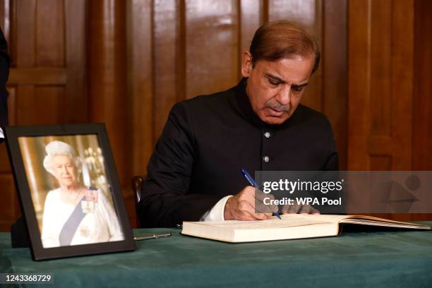 Prime Minister of Pakistan, Shehbaz Sharif, signs a book of condolence at Church House following the State Funeral of Queen Elizabeth II on September...