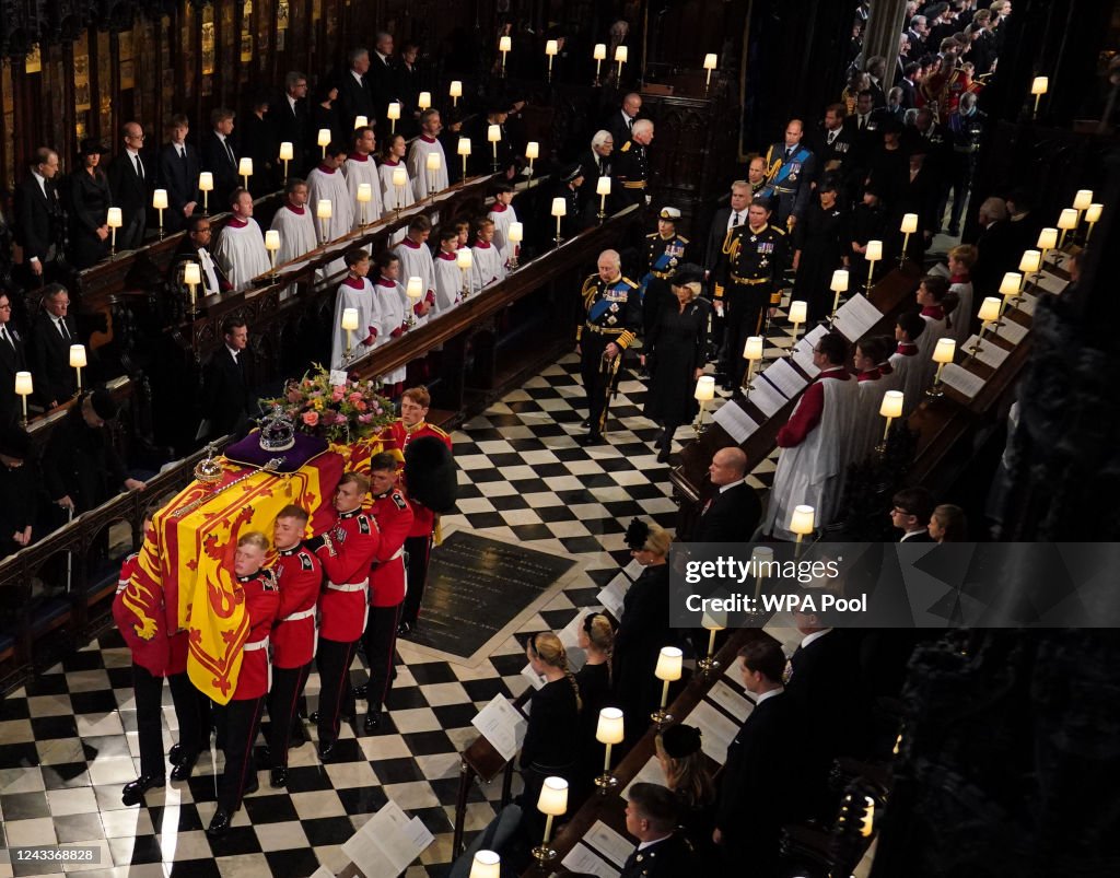 Committal Language The coffin of Queen Elizabeth II, followed by King Charles III, the ...