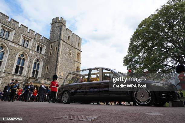 King Charles III, Princess Anne, Prince Andrew and Prince Edward, from left, follow the hearse with the coffin of Queen Elizabeth II moving towards...